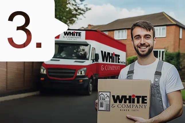 Plymouth removals company worker loading the removals truck with boxes and furniture